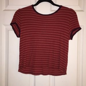 red shirt with stripes of red and white